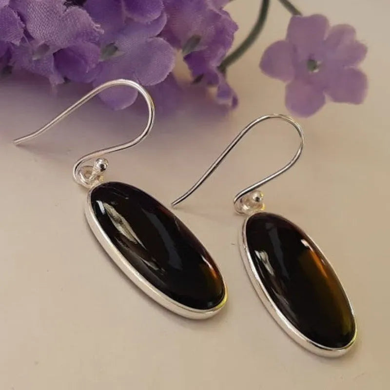 Women's earrings with oval black agate pendant and electroplated 925 silver geometric setting