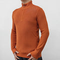 Men's grey half-turtleneck zip-up sweater on a hanger, showing front zip and long sleeves.