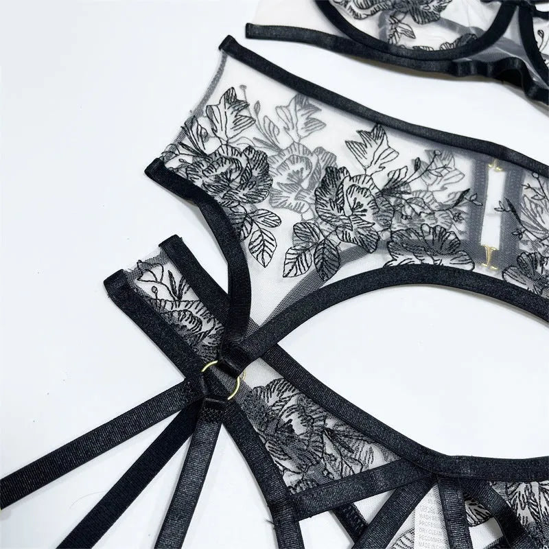 Women's black lace three-piece set with floral print showing top, pants and waist ring