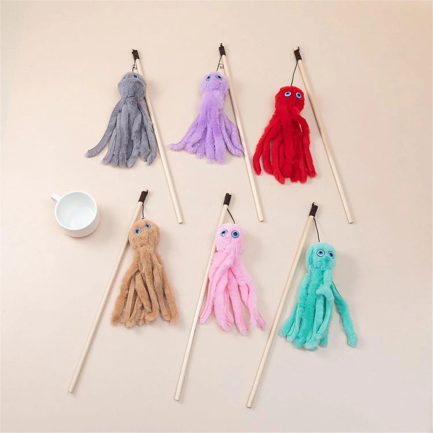 Octopus-themed cat toy with long stick handle and colourful furry texture for indoor kitten play