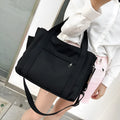 Large capacity canvas tote bag with internal organisation pockets and open on both sides zipper closure