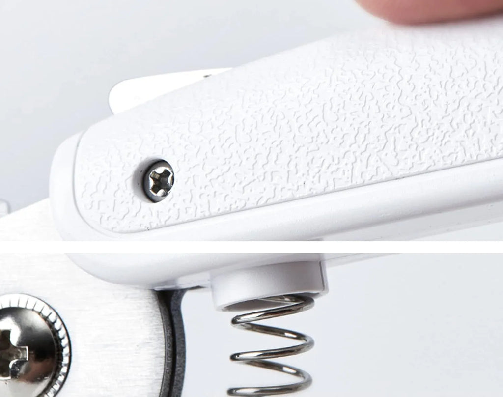 White pet nail clipper with LED light on handle and transparent anti-splash guard surrounding the blades.