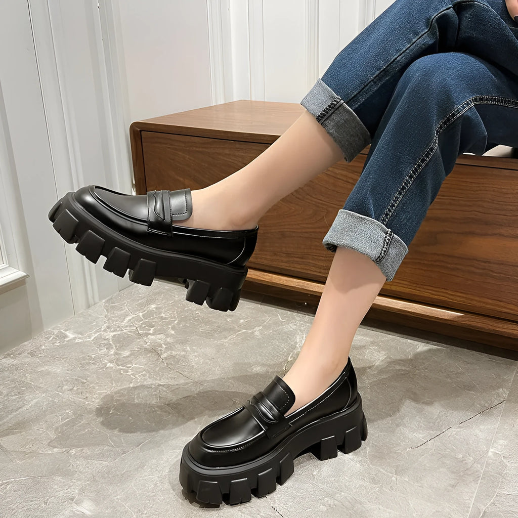 British style wide fit patent leather loafers with a rubber sole and muffin heel, shown in a choice of finishes.