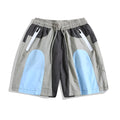 Blue loose-fit quick-drying beach shorts with elastic waistband shown flat