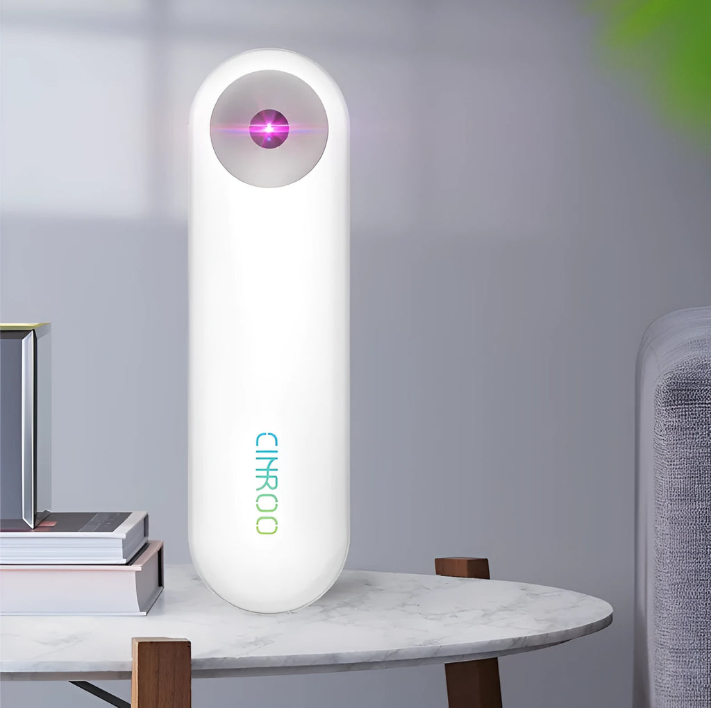 White portable UV sterilizer lamp showing compact dimensions of 116mm length with battery capacity and disinfection specifications