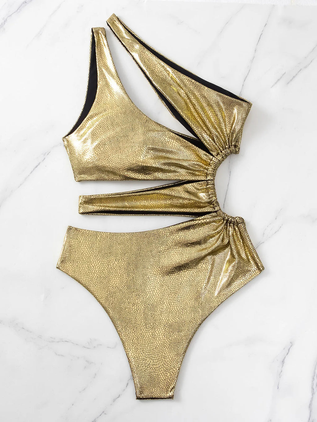 Women's solid gold one-piece swimsuit with backless, sleeveless design on a mannequin