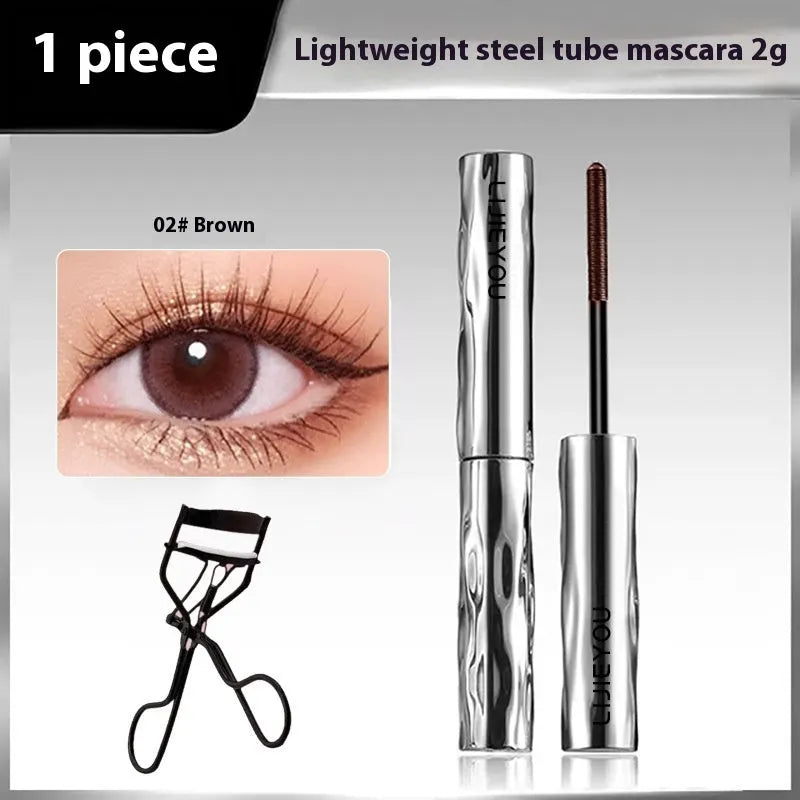 Waterproof mascara with steel tube and brush, shown in black and brown colour options, some sets include an eyelash curler.