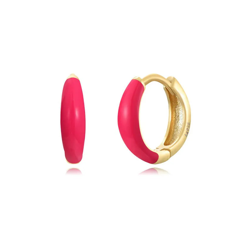 Curved geometric epoxy oval earrings in coloured finish on silver-tone copper post