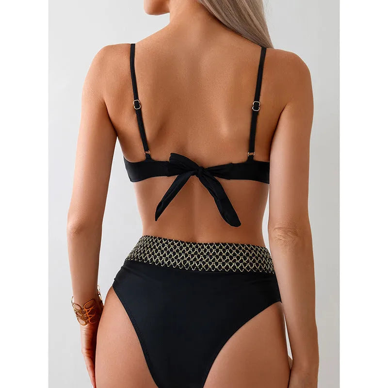 Black two-piece bikini swimsuit set with sleeveless top and briefs on a mannequin