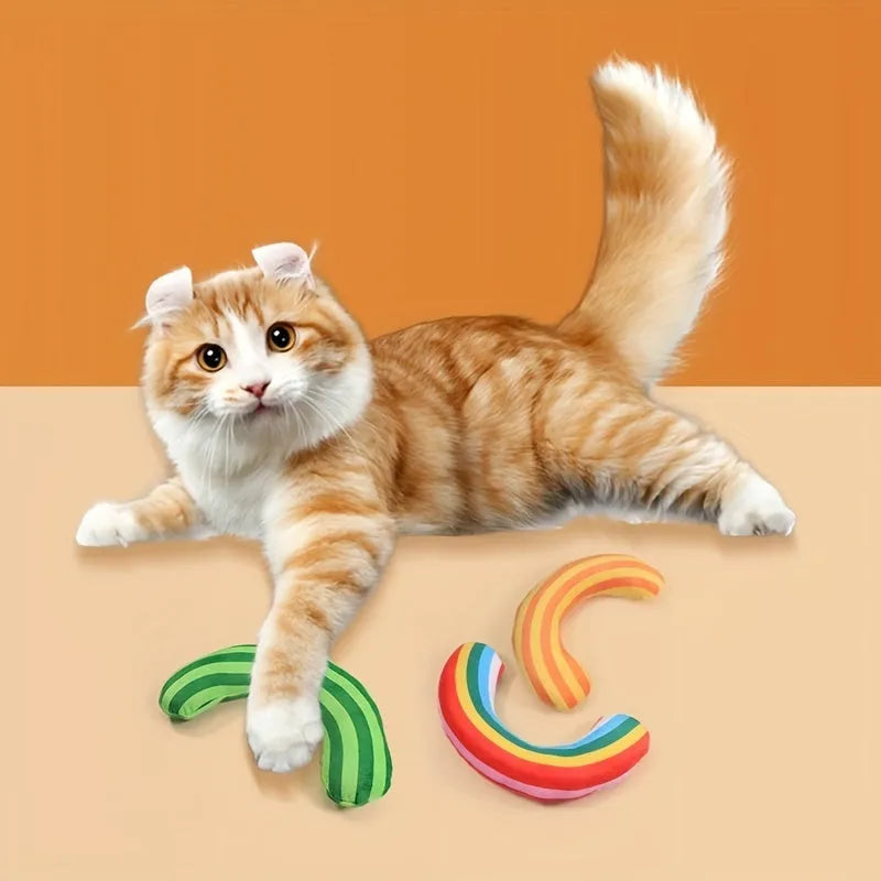 Striped pattern cat pillow toy in green, rainbow, or yellow, showing dimensions of 23cm by 20cm.