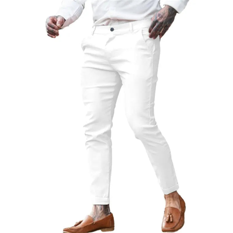 Men's slim fit pencil trousers in cotton twill fabric with stretch, showing zipper fly and mid-waist design