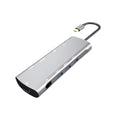Grey USB C docking station with HDMI, VGA, and USB 3.0 ports for laptop connectivity