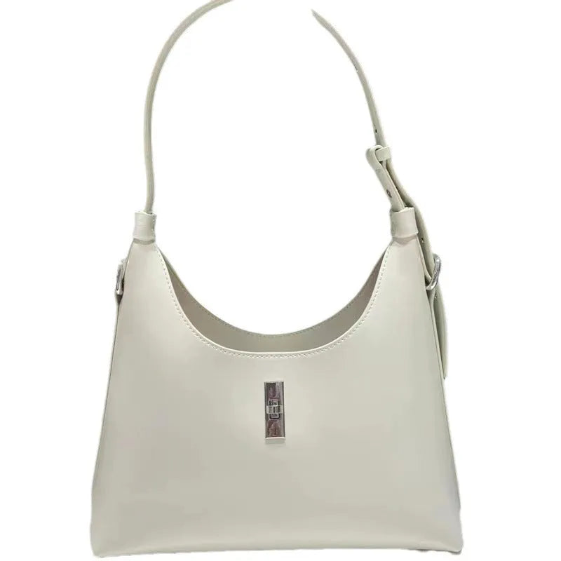 Soft genuine leather dumpling-shaped crossbody bag in apricot with sewing thread detail.