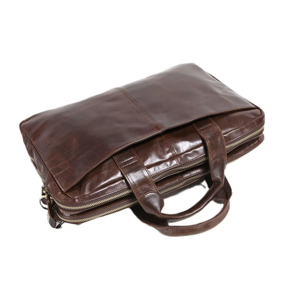 Brown men's business briefcase made from first layer cowhide leather measuring 18 inches