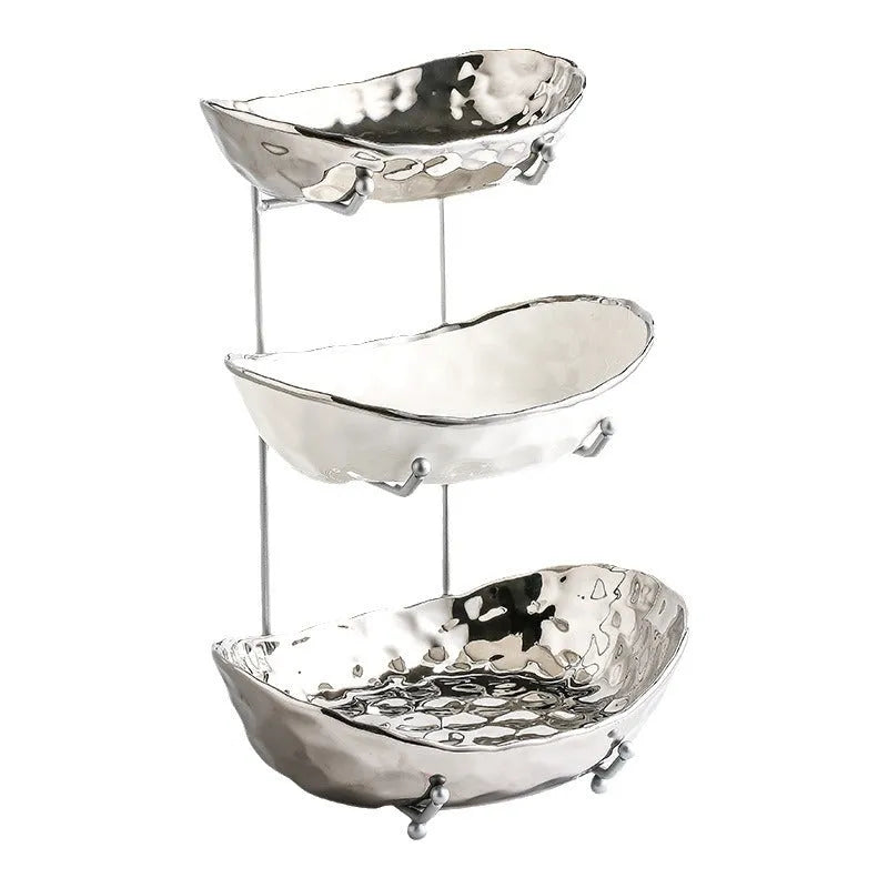 Multi-layer porcelain fruit tray with gold or silver electroplated stone texture frame, shown in double or triple tier.