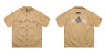 Men's black plus size cotton blend loose fit shirt with half sleeves and a chest pocket.
