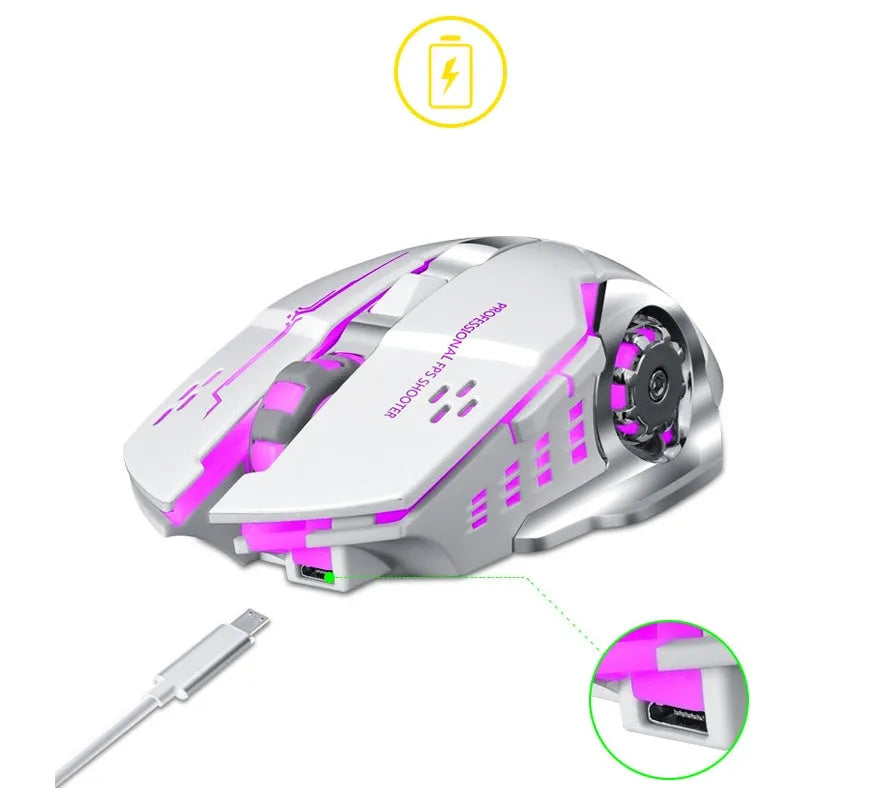 Black and white wireless charging silent computer mouse on a desk next to a laptop