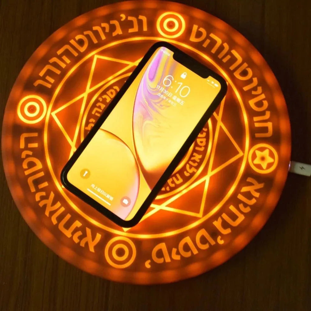 Square wireless charger with glowing magic array pattern design on desk