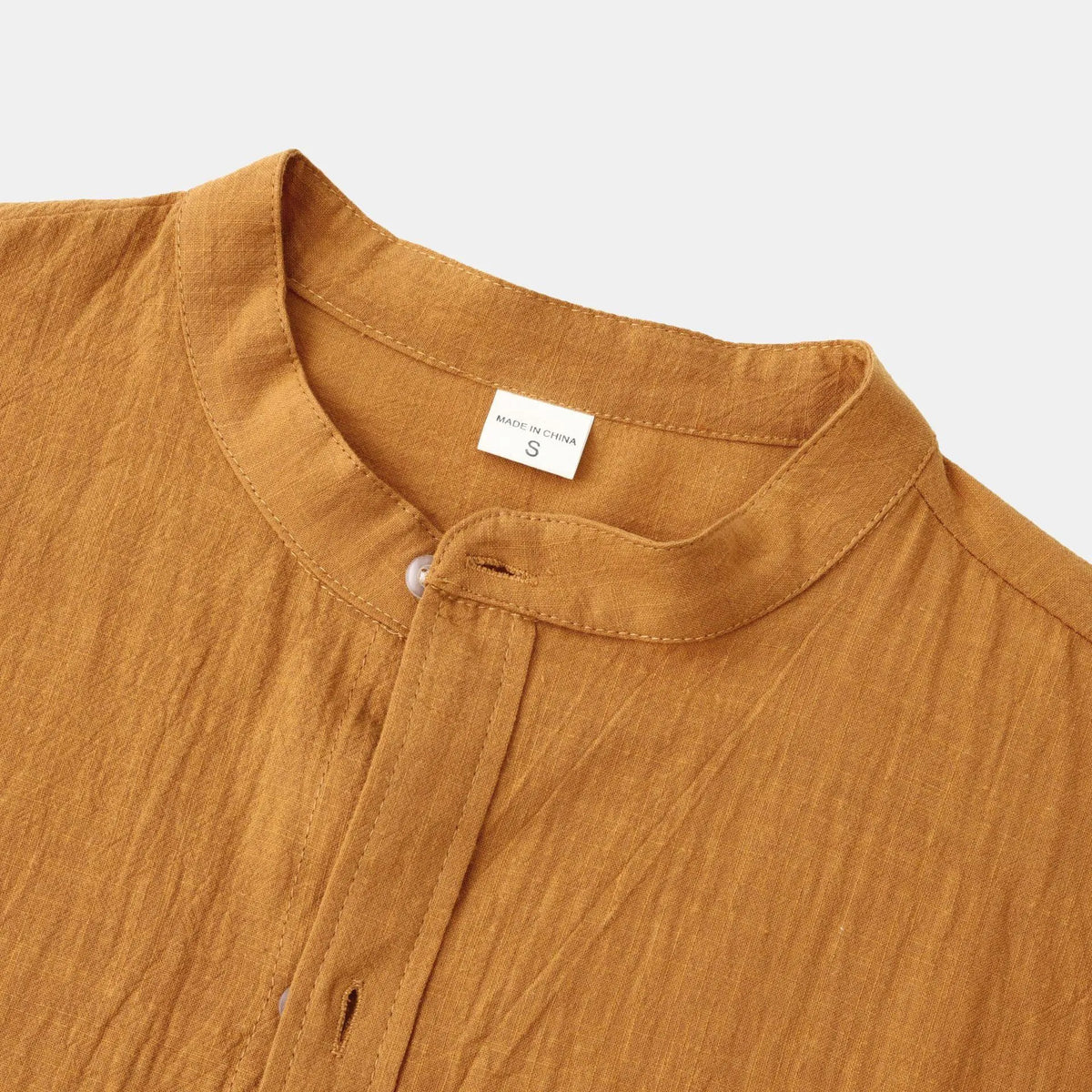 Men's slim-fit brown cotton blend long sleeve shirt on hanger