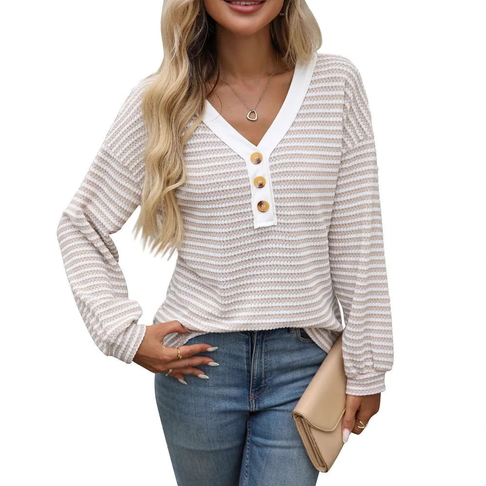 Women's loose V-neck pullover top with button front and patchwork style in various colours.