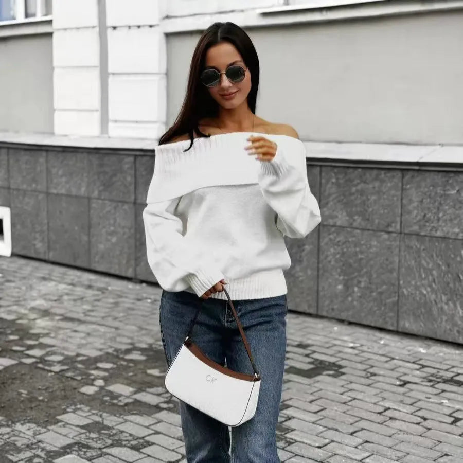 Grey off-the-shoulder strapless pullover sweater with a 3D pattern texture.