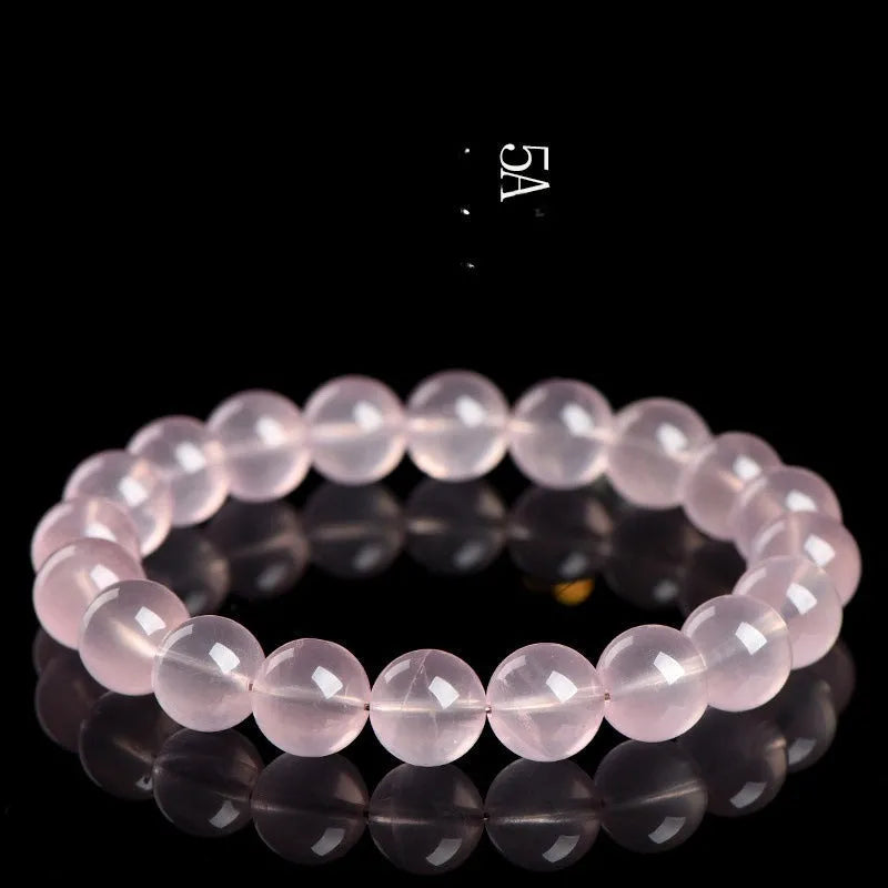 Women's crystal bracelet with polished round beads in pink starlight crystal, available in multiple bead sizes