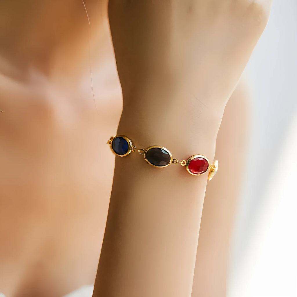 Geometric ellipse bracelet in 18K copper with blue glass inlay embroidery