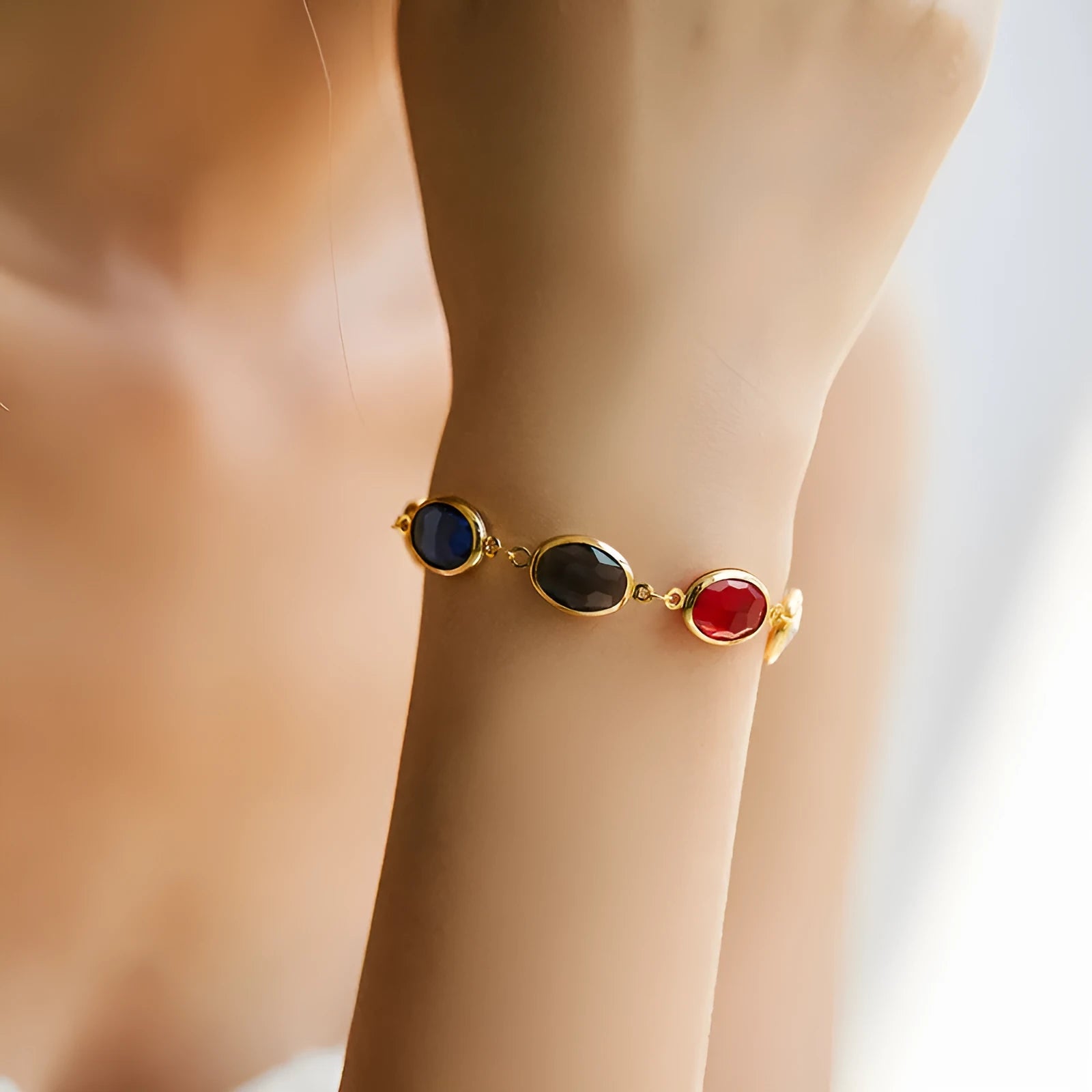 Geometric ellipse bracelet in 18K copper with blue glass inlay embroidery