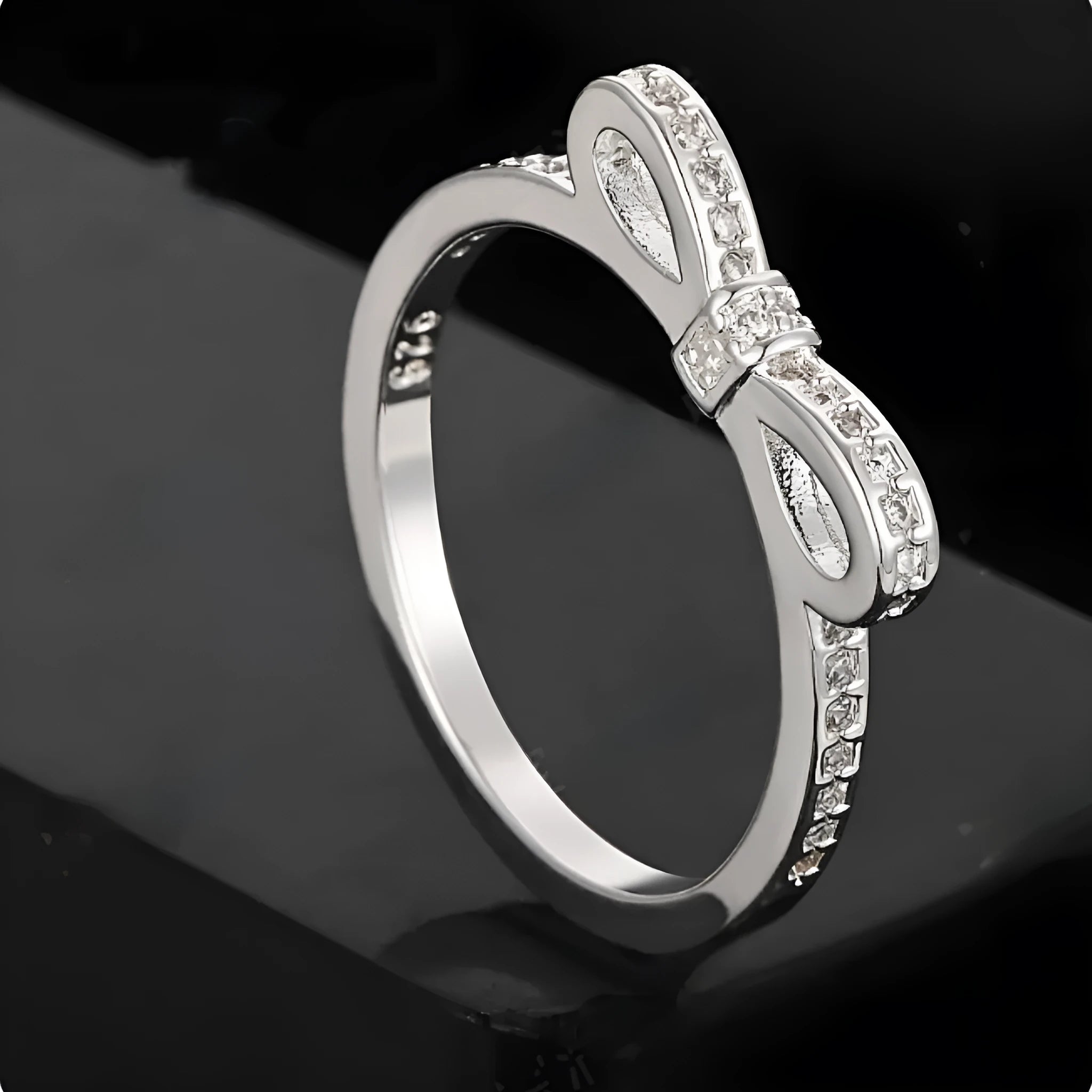 Silver bow-shaped ring with crystal zircon rhinestones in couple style design