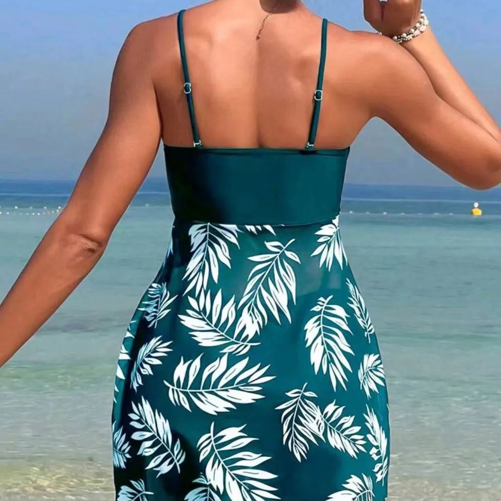 Women's high waist mesh swim briefs in black, blue, and peacock green on a mannequin.