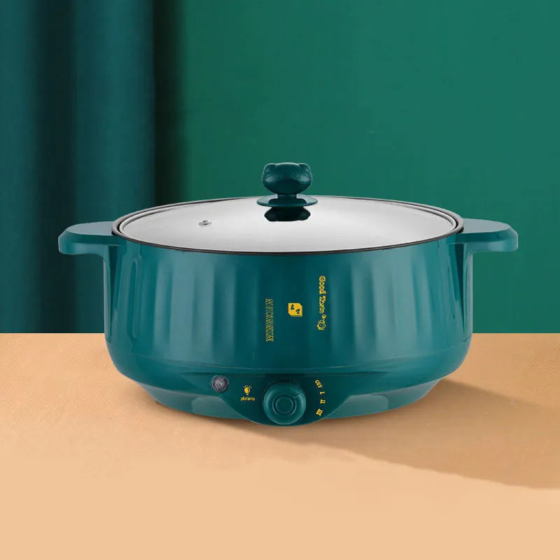 Stainless steel electric cooking pot with non-stick interior and integrated heating element