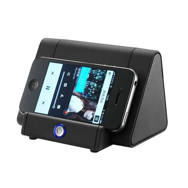 Small black or white wireless Bluetooth mini speaker for mobile phones and laptops.