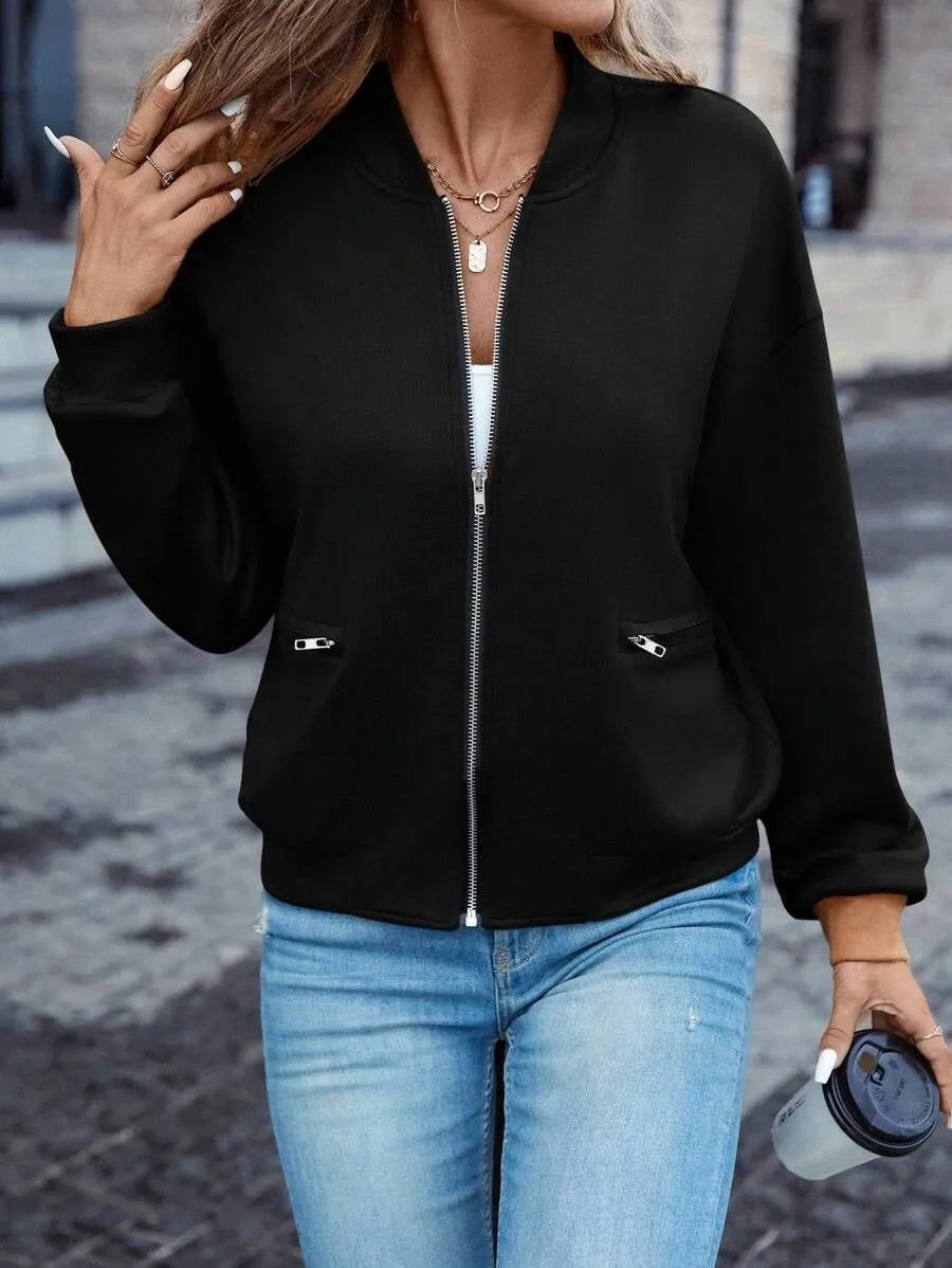 Black women's zip-front casual jacket with long sleeves and faux pocket detailing