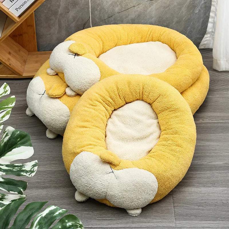 Corgi-shaped plush pet bed for dogs and cats in three sizes on a neutral background.
