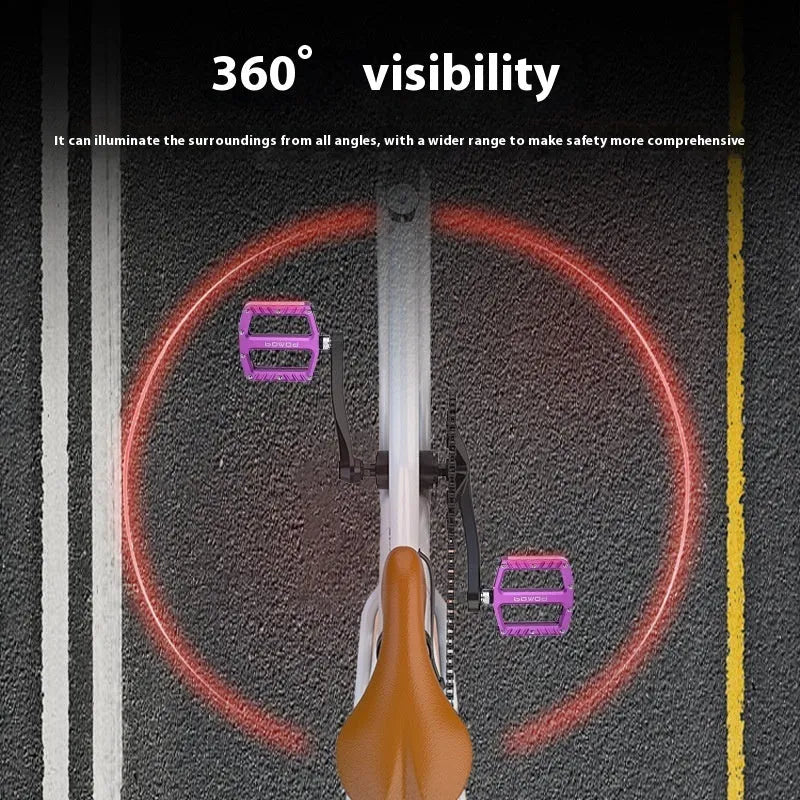 Bicycle pedal with integrated LED lights in aluminium alloy construction showing colour options