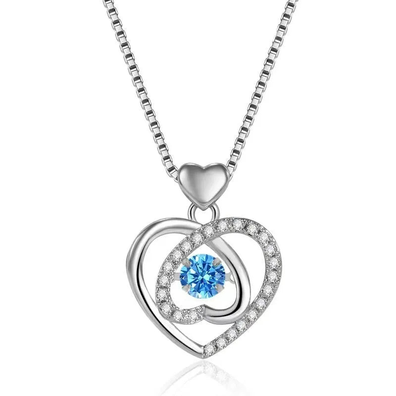 Blue diamond coloured beating heart necklace and bracelet set with gem inlaid pendant on electroplated copper.