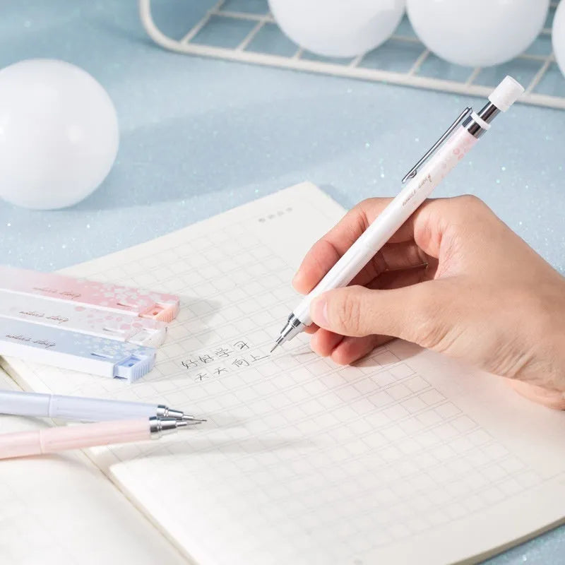 Cartoon style automatic pencil set with three pens and HB lead refills in mixed colours.