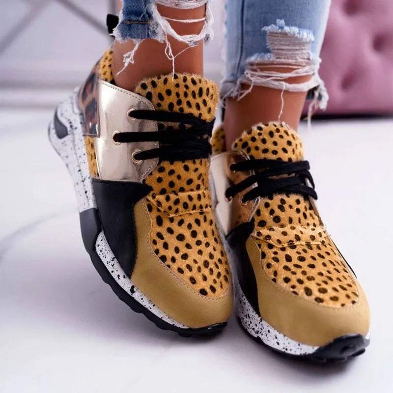 Women's casual suede sneakers with wedge heel in various colours and patterns.