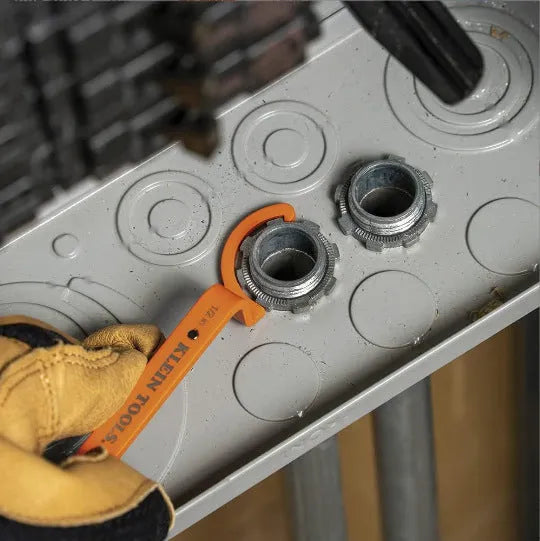 Orange, grey, and black crescent wrenches with magnetic suction lock in a three-piece tool kit.