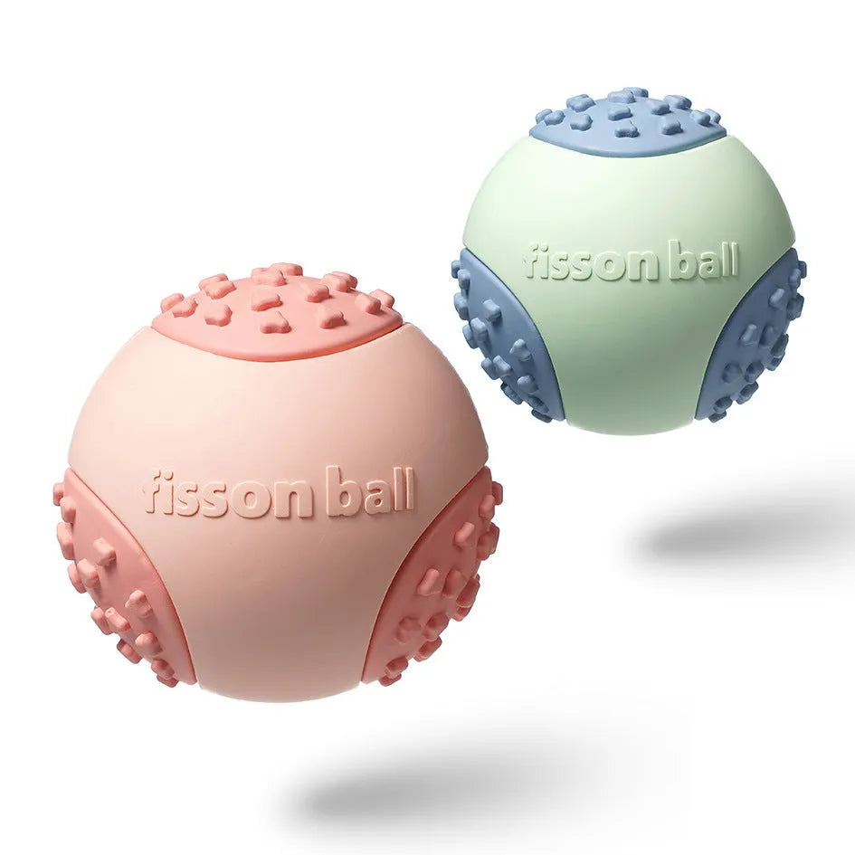 Green and pink interactive rolling ball dog toy with 64mm diameter