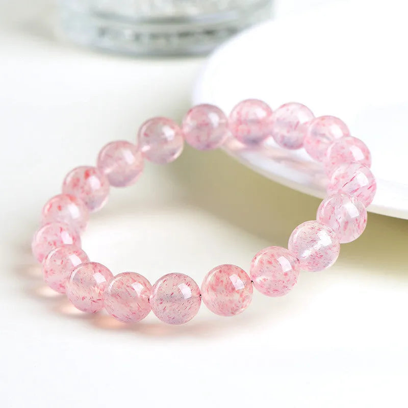 Natural white water strawberry quartz crystal bracelet with 19 round beads measuring 10-10.8mm