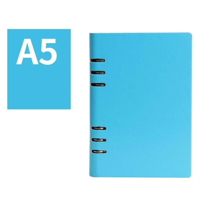 Loose-leaf business notebook in seaweed green imitation leather cover showing A5 size with beige paper