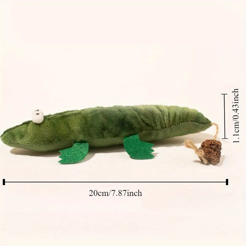 Green plush alligator catnip toy with peppermint scent for oral cleansing and stress relief
