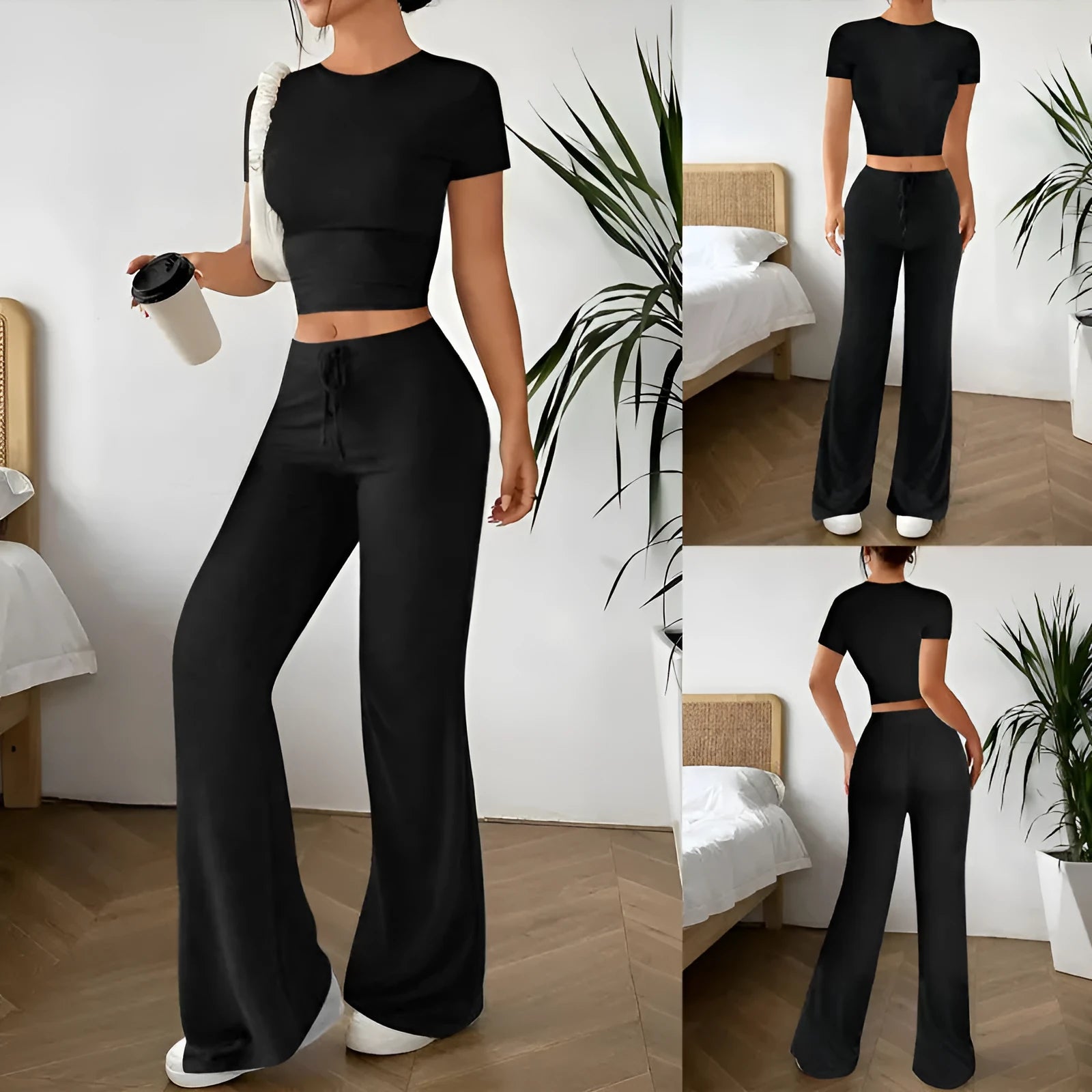 Black women's high waist trousers and short sleeve top coordinated suit set on a hanger.