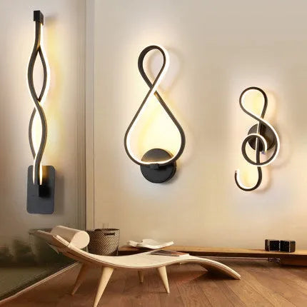 LED wall lamp with silicone shade in black or white finish showing button switch control