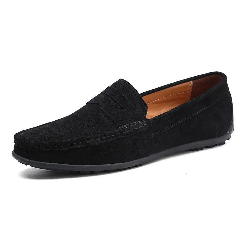 Men's brown suede Gommino casual shoes with round toe and flat rubber sole on a white background