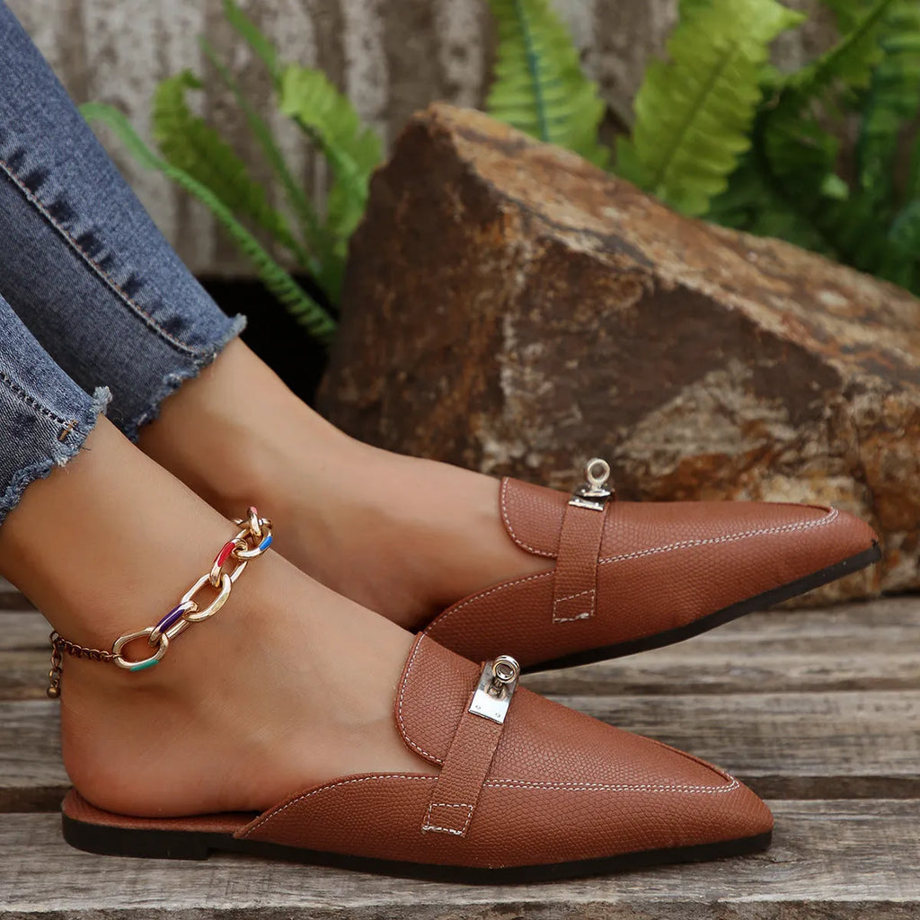 Light brown women's pointed-toe low heel semi-slippers on a white background