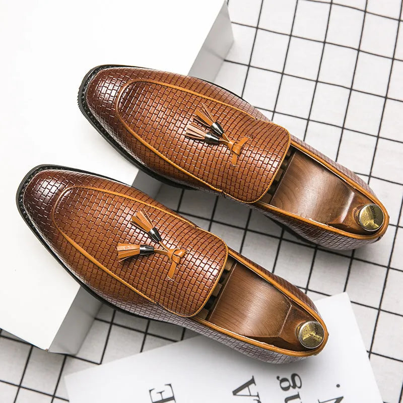 Men's black pointed toe slip-on business shoes with tassel detail