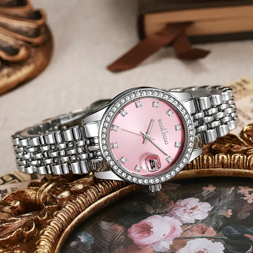 Women's silver alloy quartz watch with calendar display on a wrist