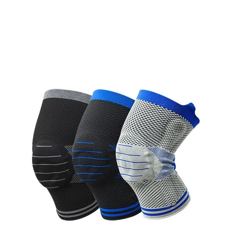 Cotton knee pad with silicone shock absorber in black and blue colour, shown with size tags for M, L, and XL.